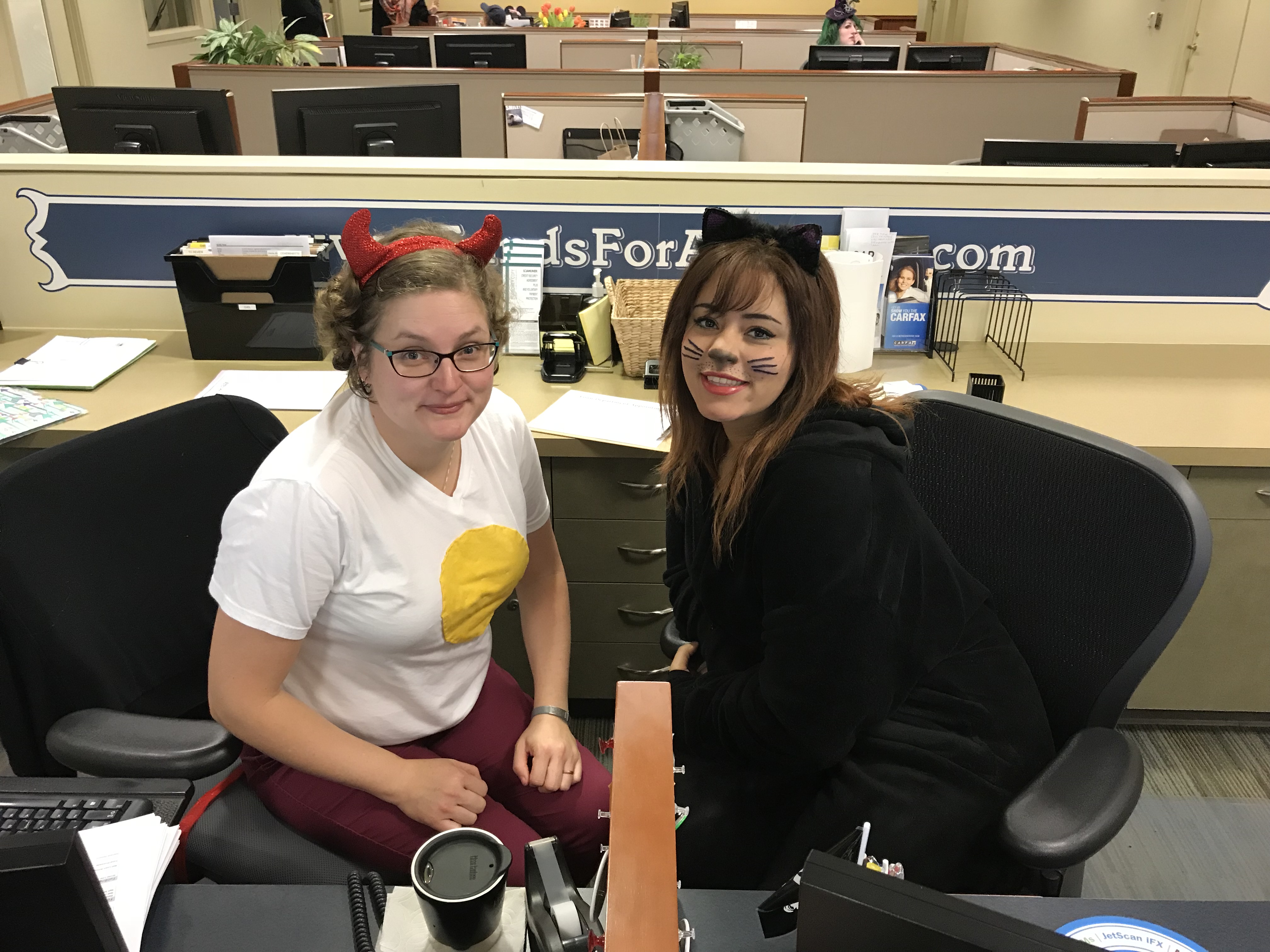 Two women sitting at desk