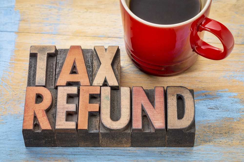 tax refund made out of wooden blocks