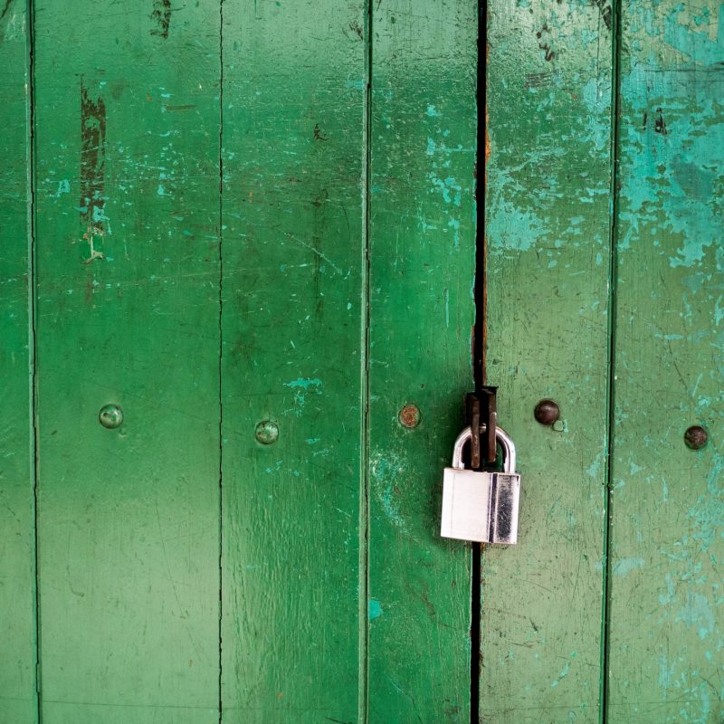 green door with lock