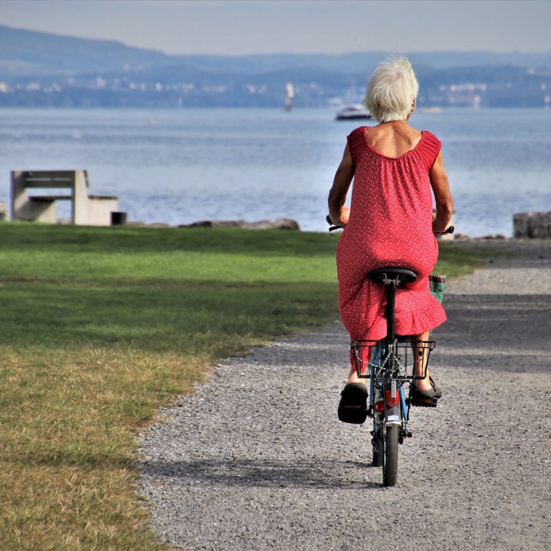 older woman riding a bike