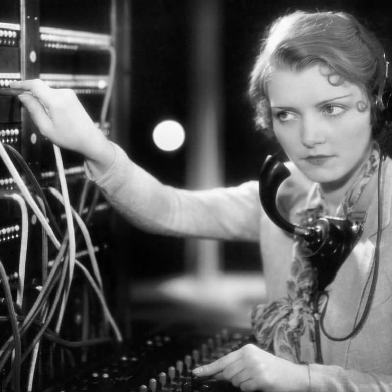 woman operating telephone switchboard