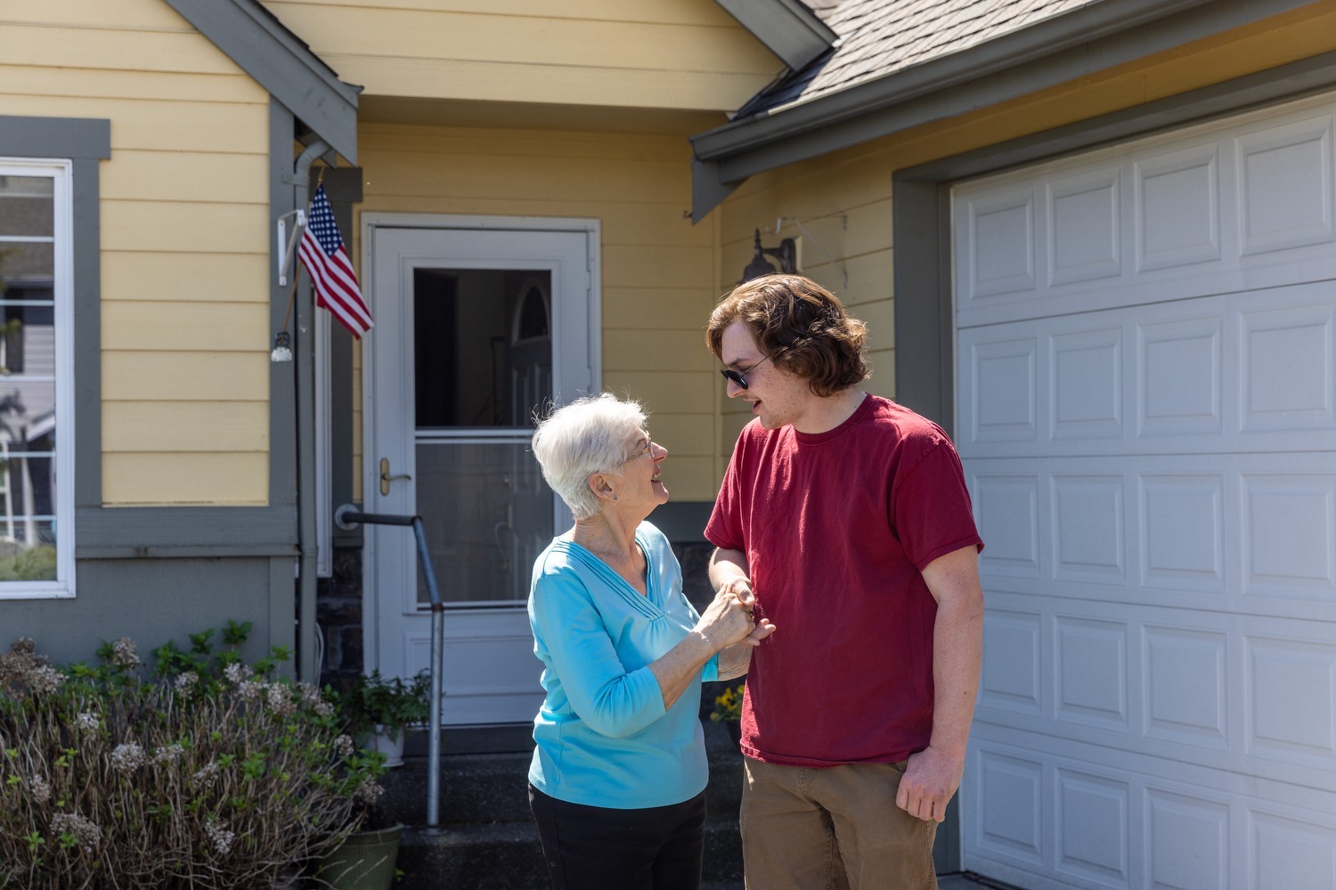 A grandma and her grandson discussing wrcu family finances