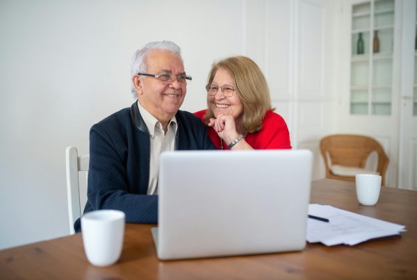 An older couple reviewing a tax prep checklist