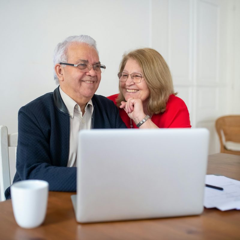 An older couple reviewing a tax prep checklist