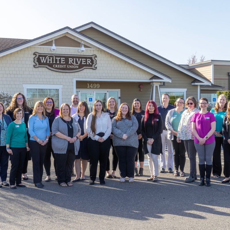 A group of credit union employees at a member-owned credit union