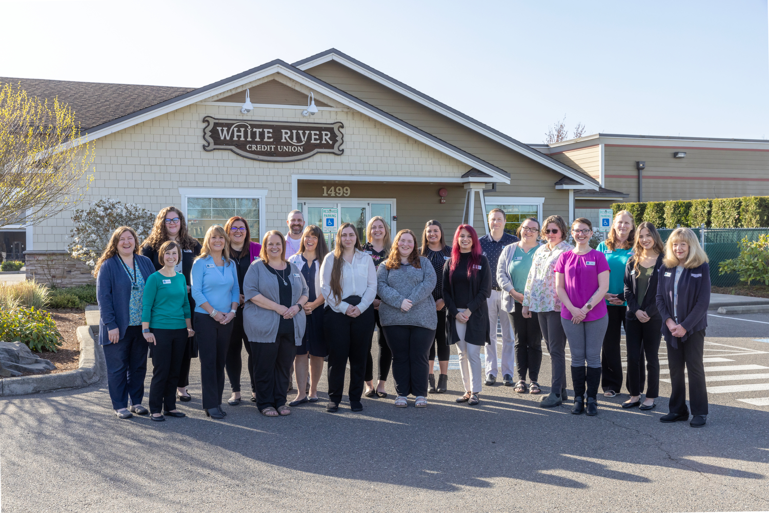 A group of credit union employees at a member-owned credit union